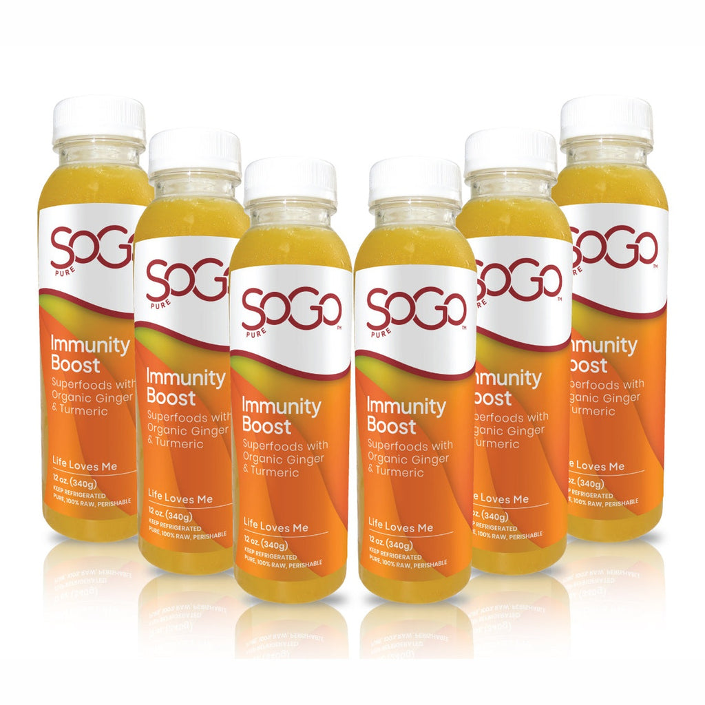six- 12 oz bottles of SoGo Immunity Boost Juice arranged in a row, citurs juices with organic ginger and turmeric and superfoods
