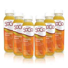 six- 12 oz bottles of SoGo Immunity Boost Juice arranged in a row, citurs juices with organic ginger and turmeric and superfoods