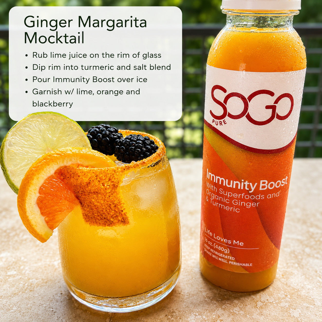Ginger Margarita Mocktail in a glass and a bottle of SOGO Pure  Immunity Boost juice  next to it.  A recipe card for the mocktail is above the drink.