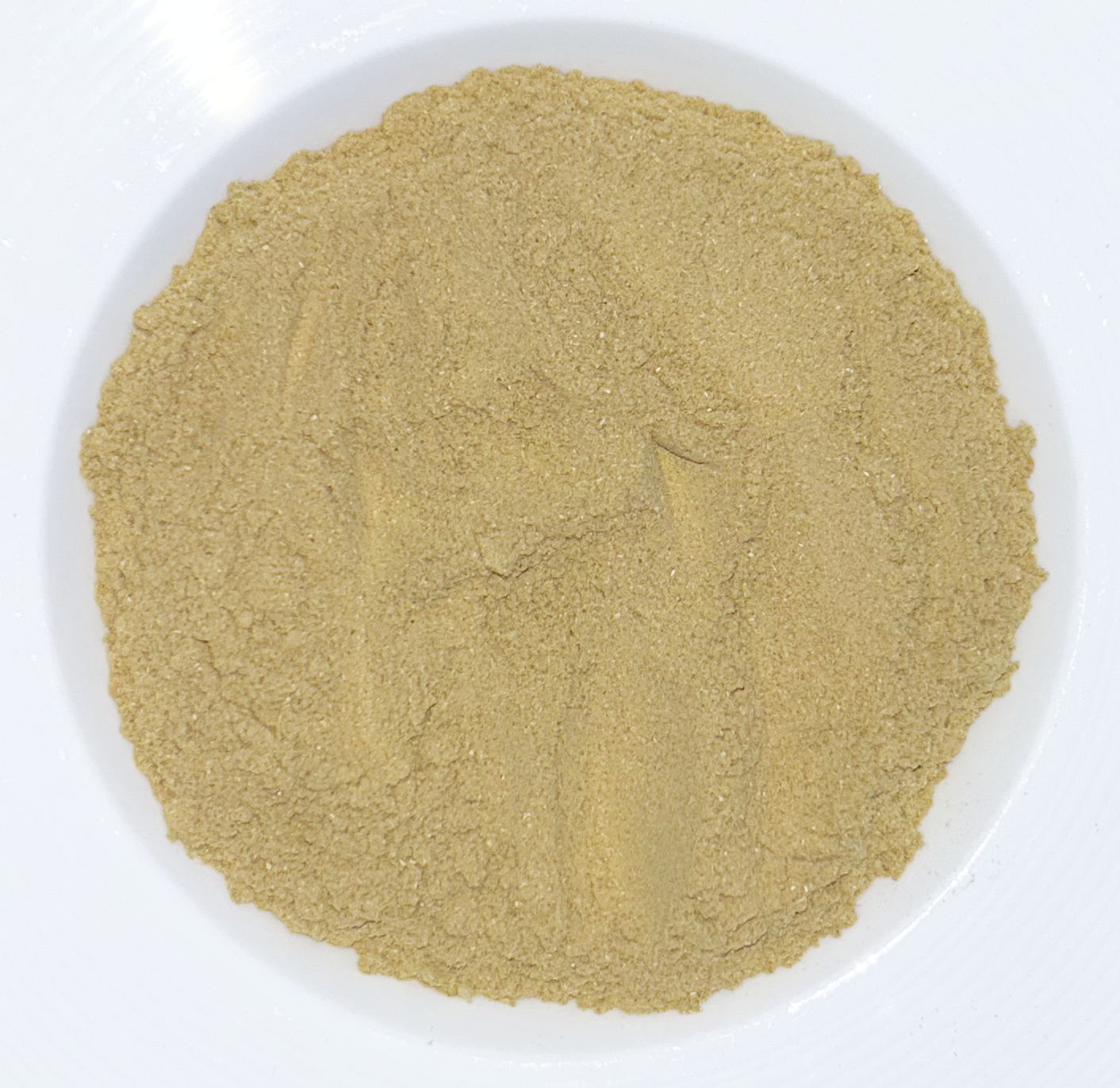 A bowl of Unstress Me Superfood powder on a white background.