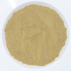 A bowl of Unstress Me Superfood powder on a white background.